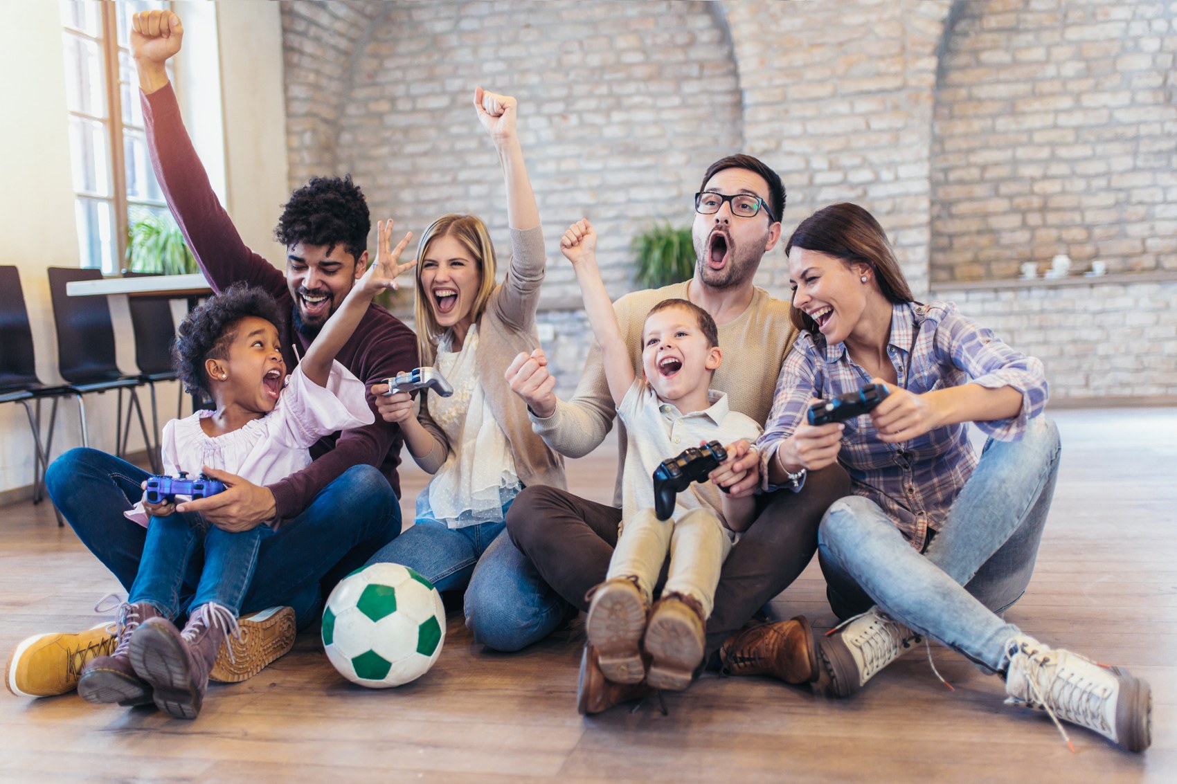 Family cheering together at home
